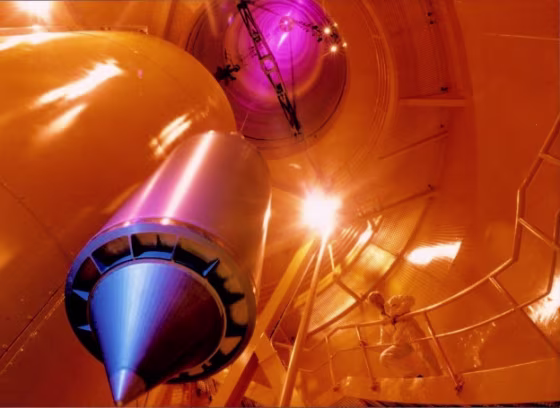 A drop capsule (lower left) is prepared for a free-fall experiment using the drop tower at the University of Bremen.