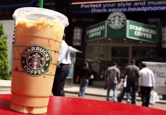Image: A Starbucks drink is seen on a table in New York's Times Square