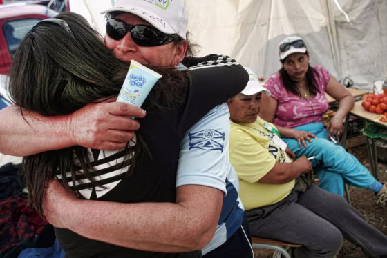 Image: Relatives of the miners trapped in the S
