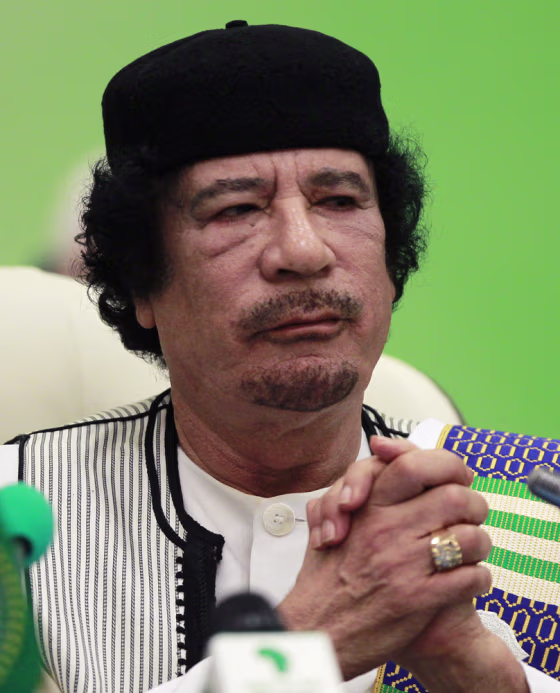 Image: Libya's leader Muammar Gaddafi delivers a speech at the start of the third EU-Africa summit in Tripoli