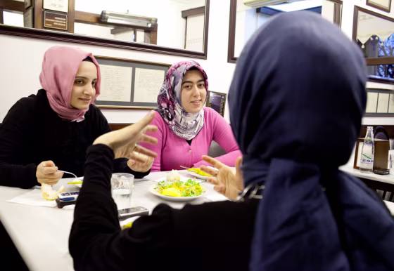 From left to right, Funda Altintas, Esma Bendez and Fatma Betul Yumuk talk about their futures on a recent night out in Istanbul.