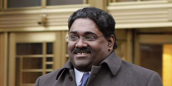 Image: Galleon hedge fund founder Raj Rajaratnam leaves federal court after opening arguments in his insider trading case in New York