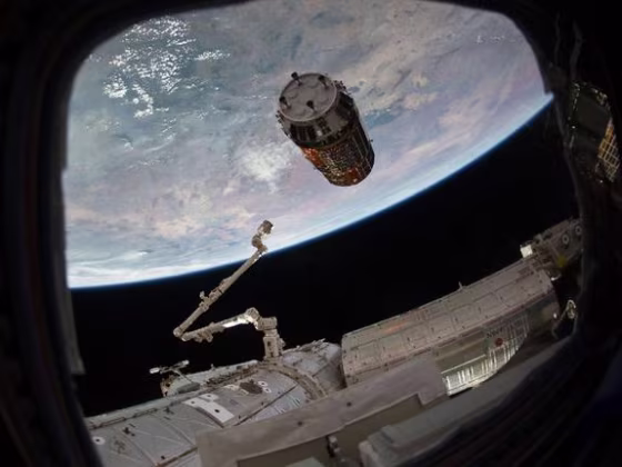 Japan's HTV-2 robotic cargo ship is seen just before astronauts grapple it on Jan. 27. The spacecraft is one of several robotic cargo ships that ferry supplies to the space station.