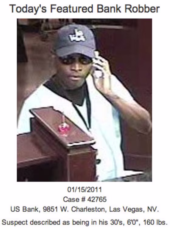 Image: Security camera shot of an alleged bank robber with information about suspect