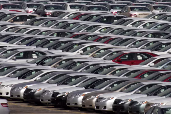 Image: Cars produced at the Subaru of Indiana plant in Lafayette, Ind., sit in a holding lot outside the factory.