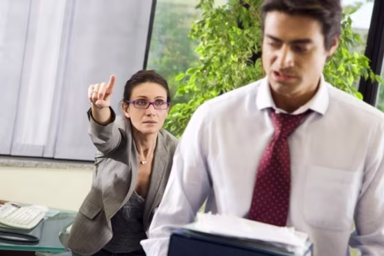 Image: Boss telling subordinate to get out.