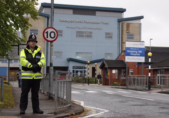 Image: A police officer at Stepping Hill hospital
