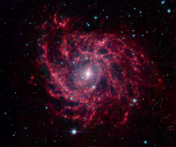 Enhanced telescope photo: galaxy shaped like spider web