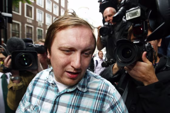 Image: Jonathan May-Bowles makes his way past cameras as he arrives at City of Westminster Magistrates' Court in London