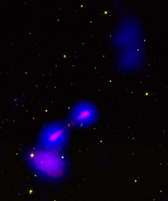 This composite photo shows the exotic galaxy Speca about 1.7 billion light-years from Earth. It is only the second hespiral, as opposed to elliptical, galaxy known to produce large, powerful jets of subatomic particles moving at nearly the speed of light.