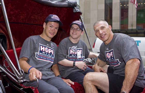 Image: Joe Girardi, right, with Andrei Sullivan, 19, left, and John Lahutsky