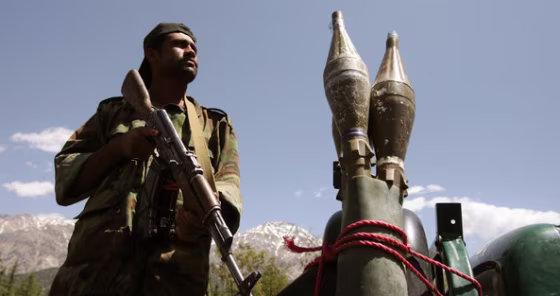 An Afghan soldier near the border with Pakistan in May 2007, around the time of a border dispute and an attack on Americans. 
