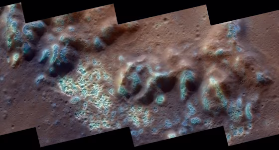 This image from NASA's messenger probe provides a spectacular view of the "hollows" on Mercury's surface — depressions that may have been formed by the removal of volatile-containing material exposed within impact craters. Shown here is an interior portion of the floor and peak-ring mountains of the Raditladi impact basin.