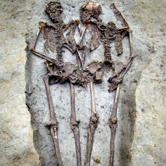 Two skeletons found in central-northern Italy reveal the couple was buried holding hands some 1,500 years ago.