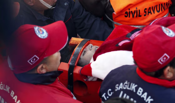 Image: Gul Karacoban, and earthquake survivor,  is carried out in Ercis
