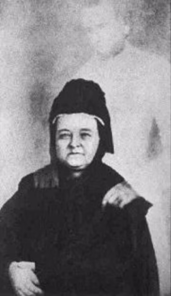 This picture of the ghost of slain President Abraham Lincoln standing behind Mary Todd Lincoln was faked by William Mumler.
