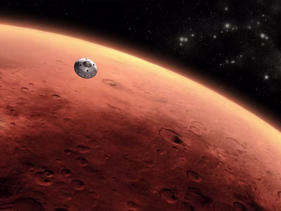 Artist's render of spaceship over Mars