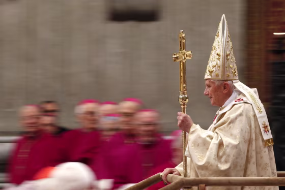 Image: Pope Benedict XVI arrives to lead the Christmas mass in Saint Peter's Basilica at the Vatican