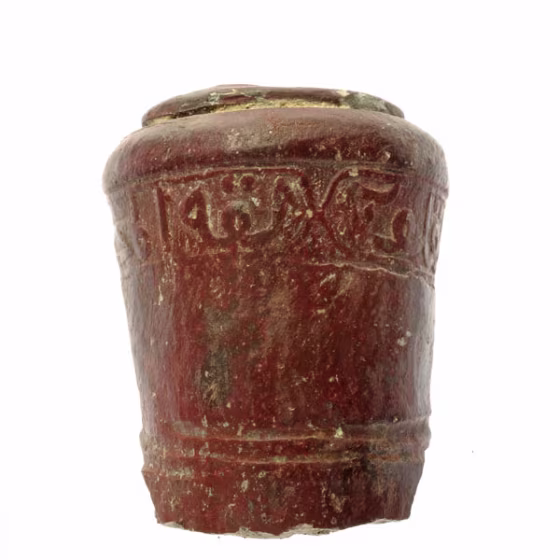 close-up image of an inscribed pipe