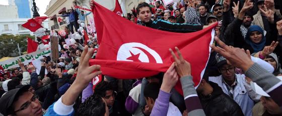 Image: Tunisians turn out to demand jobs and dignity as the country marks a year to the day since its despotic ruler fled