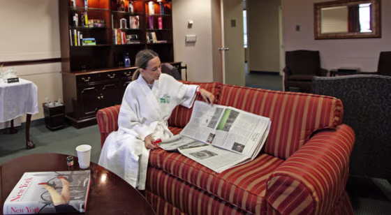 Nancy Hemenway in the library of Mount Sinai Medical Center's Eleven West wing, where the best room costs $1,600 a day - on top of whatever base rate insurance pays to the hospital.