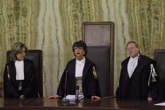 Image: Chief judge of the court Francesca Vitale, center, reads the verdict