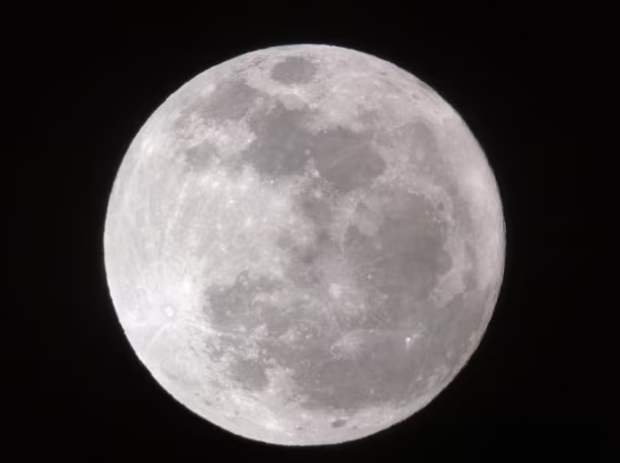 Skywatcher Maxim Senin caught the full moon during the moon's conjunction with Mars on March 7 in Long Beach, Calif. Will cosmonauts be visiting soon?