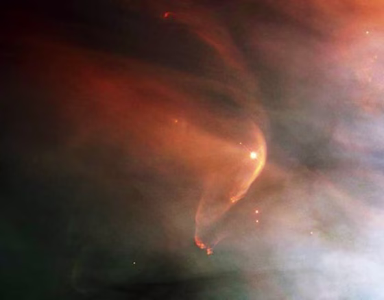 Shown in a Hubble Space Telescope image, the "astrosphere" around the star L.L. Orionis approximates the heliosphere around our solar system.
