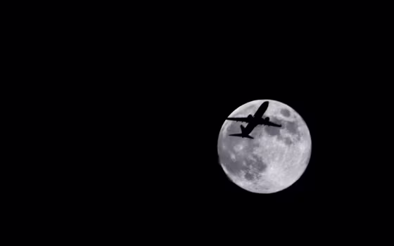 Photographer Sid Vedula captured this amazing view of the full moon of Aug. 1 from Houston, Texas with a passing airplane in silhouette.