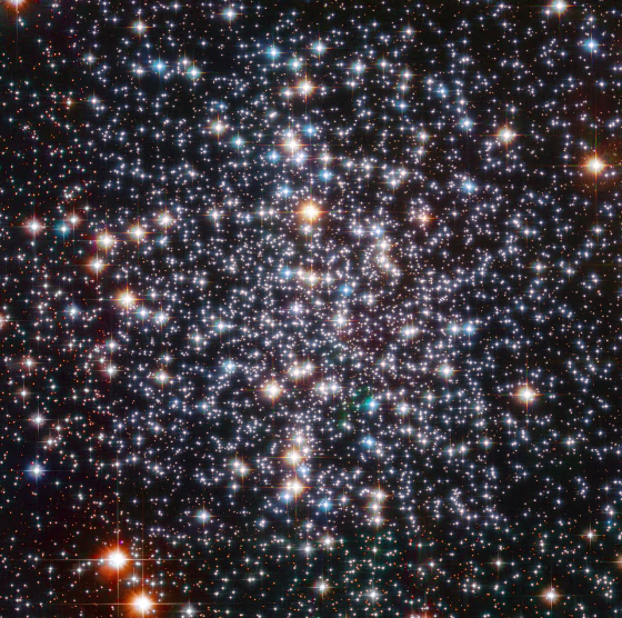 The many stars of the M4 globular cluster blaze like fireballs in this image snapped by the Hubble Space Telescope.
