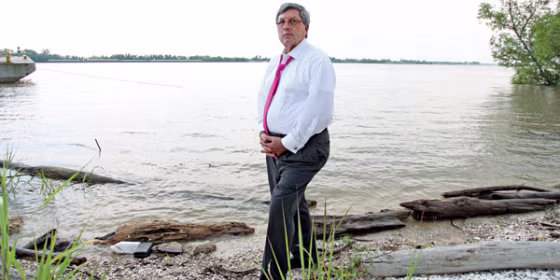 Daniel Becnel Jr. on the banks of the Mississippi River near his hometown of Garyville, La.