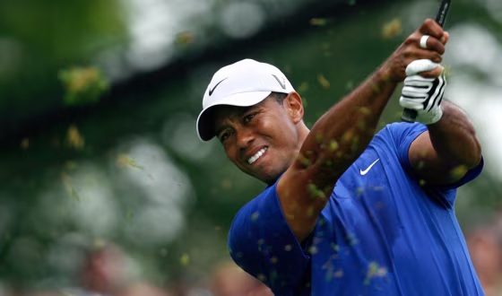 Image: Tiger Woods tees off on 4 during the 2009 PGA Championship golf tournament at Hazeltine National Golf Club in Chaska, Minnesota