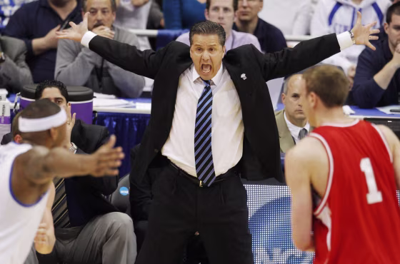 Image: Kentucky's head coach Calipari directs his team from the sidelines against Cornell during the first half of their NCAA East Regional college basketball game in Syracuse