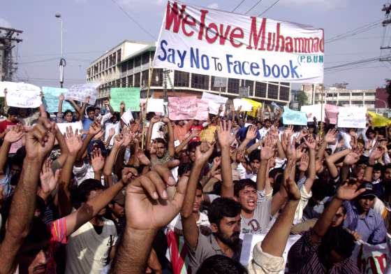 Image: Pakistani students chant slogans during a rally against Facebook page
