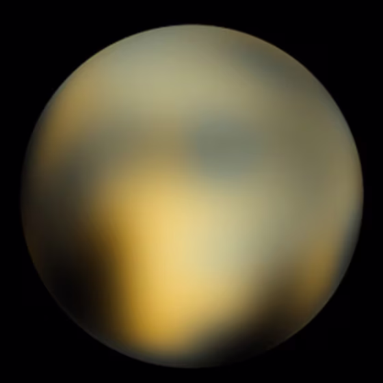 Pluto has an icy exterior, but inside, the decay of radioactive potassium may have melted an ocean of liquid. 