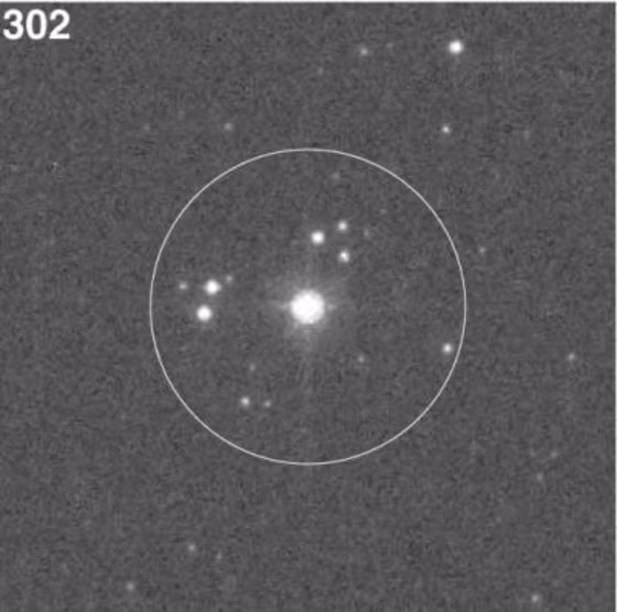This is Star 302, one of a group of seemingly isolated massive stars, as viewed through the Hubble Space Telescope, which can zoom in roughly 40 times closer than a ground-based telescope. From the ground, everything within the circle appears to be one star.