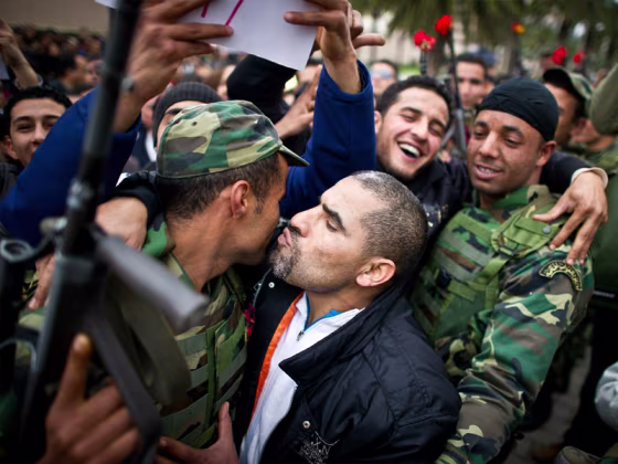 Image: People demonstrate against Ben Ali's Con