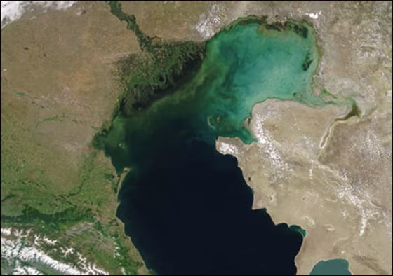 Image courtesy Jeff Schmaltz, MODIS Land Rapid Response Team at NASA GSFC |
 
Kara-Bogaz-Gol 
This satellite image shows the salty Kara-Bogoz-Gol bay near the Caspian Sea in Turkmenistan. Using measurements of gas emissions from the bay as part of their evidence, a team of scientists is arguing that once-common great salt lakes may have been at the root of the end-Permian mass extinction, when more than 90 percent of Earth's creatures died off.