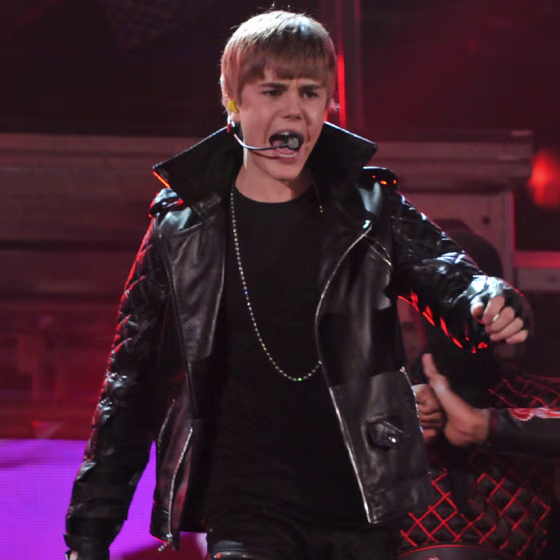 Justin Bieber, shown here performing during the 53rd Annual Grammy Awards Show, may have his ancestors' large social circles to thank for his voice.