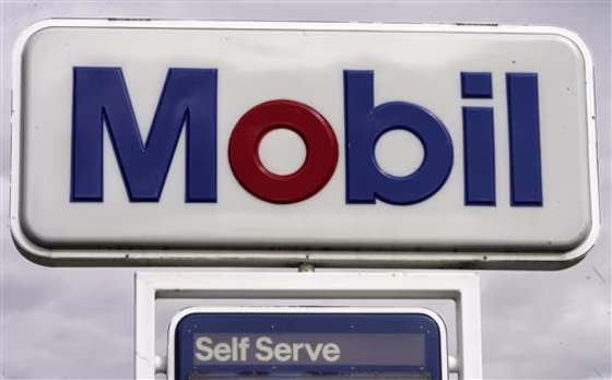Earns Exxon Mobil