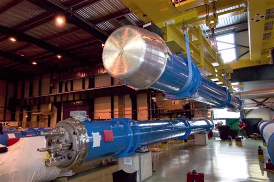 The first superconducting magnets for the Large Hadron Collider are put into place at CERN in Geneva.