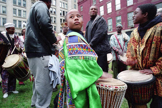 Underneath a gray Manhattan sky, thousands of people turned out for the reburial of 419 colonial-era slaves and free blacks just a short distance from the market where some of them once were sold.