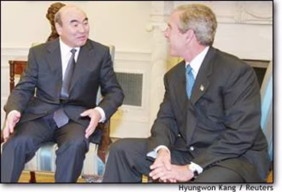 U.S. President George Bush meets with Kyrgyz Republic President Askar Akayev&nbsp;at the White House in Washington, September 23.