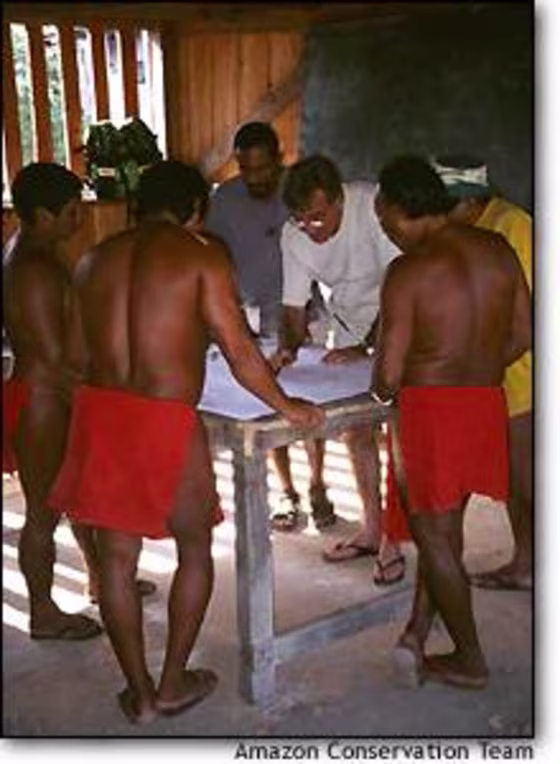 Brazilian Indians work with cartographer Milton Alcover of the Amazon Conservation Team to map ancestral lands in northeast Brazil.