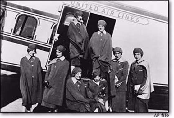 Airline stewardesses pose in front of a United Air Lines' Boeing transport in San Francisco in this May 15, 1930 file photo.