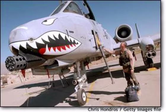 Lt. Colonel Tim of the U.S. Air Force inspects his A-10 Thunderbolt II attack aircraft, known as the "Warthog," this past September at Bagram Air Force Base in Afghanistan.