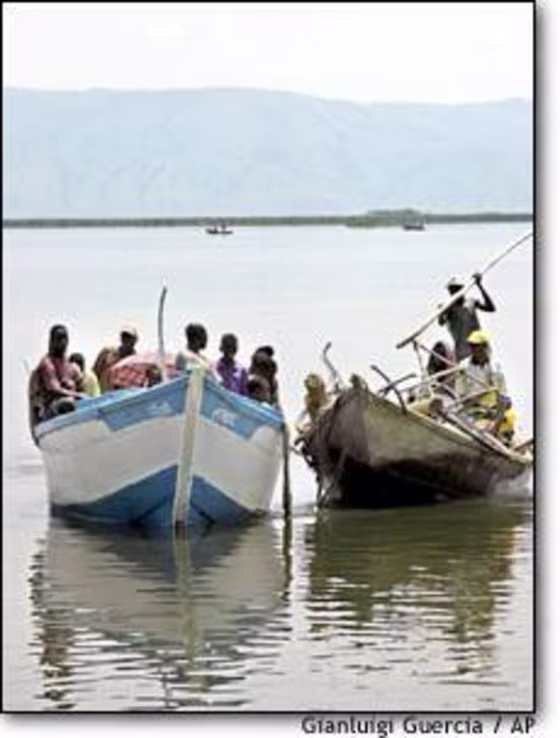 Refugees fleeing fighting in the northeastern Congolese town of Bunia arrive in boats in the southwestern town of Ntoroko in Uganda over the weekend.