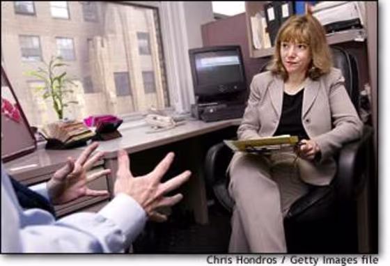 A job applicant speaks with recruiter Renee Chandler during an interview in May at the offices of Metro Support Group in New York City. The U.S. unemployment rate hit a nine-year high in June.