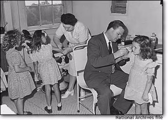 Miners' children being vaccinated for smallpox in 1946. Immune response is detected in vaccinated people for up to 75 years, according to researchers.