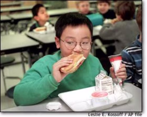 With 15 percent of U.S. children age 6 to 19 overweight, children should be eating less sweet and fatty food, advocates say. But school vending machines make that a difficult challenge.